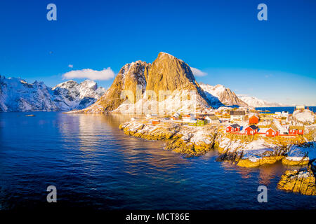 SVOLVAER, LOFOTEN ISLANDS, NORWAY APRIL 10, 2018: Above view of the harbor with buildings and boats in Svolvaer, starting point for held yearly in March International cod fishing competition Stock Photo