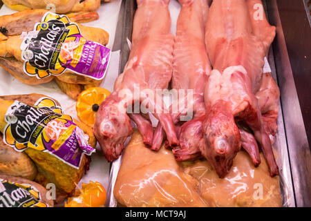 Fresh,skinned,rabbit,for,sale,to,public,at,butchers,butcher,section,of,Intermarche,supermarket,outskirts,of,Esperaza,town,Aude,region,South,of,France, Stock Photo