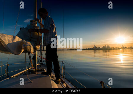 Boat and seascape during sunset, Toronto, Canada Stock Photo