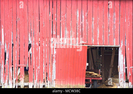 Old Red Barn with  doors opened Stock Photo