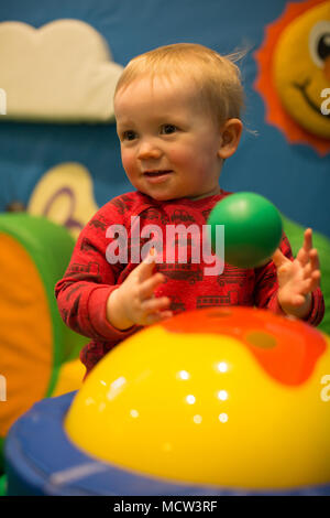 Toddler at soft play, UK Stock Photo