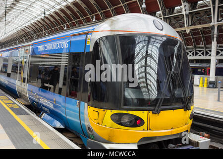 Tata Communication Heathrow Express train arriving at Paddington Station, Praed Street, Paddington, London, W2, UK Stock Photo