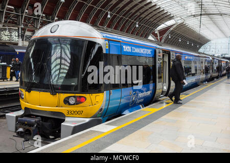 Tata Communication Heathrow Express train arriving at Paddington Station, Praed Street, Paddington, London, W2, UK Stock Photo