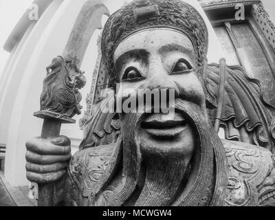 Closeup of a chinese statue at the Wat Pho temple in Bangkok, Thailand Stock Photo