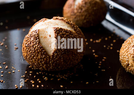 Freshly Baked Hot Cross Bun Bread with Sesames / Simit Roll. Traditional Food. Stock Photo