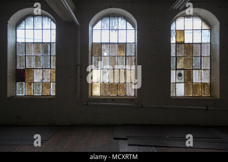Windows in an old warehouse in Paterson, NJ Stock Photo