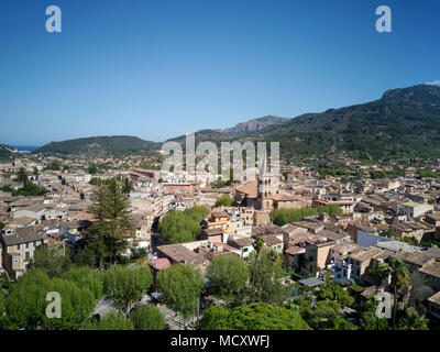 View of the old town with church of St. Bartholomew, Roman Catholic parish church, Sóller, mountains at the back Stock Photo