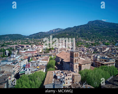 View of the old town with church of St. Bartholomew, Roman Catholic parish church, Sóller, mountains at the back Stock Photo