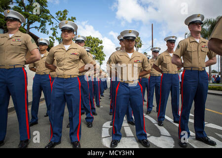 SAN JUAN CAPISTRANO, Calif. (March 24, 2018) – Marines and Sailors with 1st Battalion, 11th Marine Regiment, 1st Marine Division, prepare to march in the 60th Swallows Day Parade on March 24, 2018.  The parade is one of the nation’s largest non-motorized parades and is held annually as part of paying tribute to the city’s Spanish and western history. During the event, the Marines marched in formation and carried their unit colors and the American flag. Stock Photo