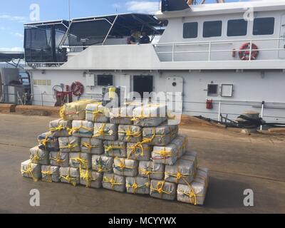 Coast Guard, Caribbean Border Interagency Group law enforcement authorities offloaded and transferred custody to the FBI of 900 kilograms of cocaine and three suspected smugglers of Dominican Republic, Colombian and Venezuelan nationalities March 6, 2018 in Ponce, Puerto Rico.   The bust resulted from an at-sea interdiction in the Caribbean Sea March 1, 2018 and was part of multi-agency federal law enforcement efforts in support of Operation Unified Resolve, Operation Caribbean Guard and the Caribbean Corridor Strike Force Initiative (CCSF). Stock Photo