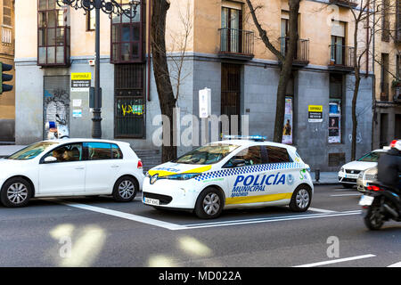 MADRID, SPAIN - 29 MARCH, 2018: Police on the streets of the city watching the order Stock Photo