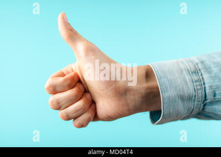 Male hand showing thumbs up Stock Photo