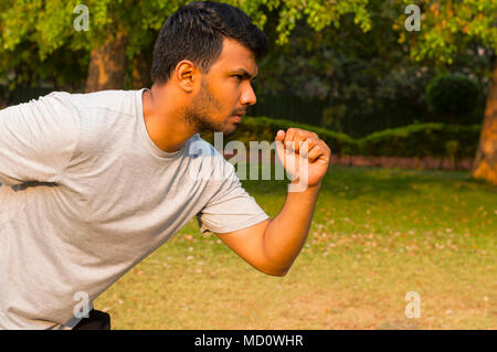 Close-up of a athlete in the ready position before going for a run Stock Photo