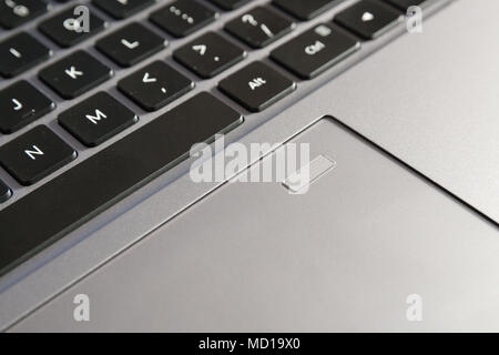 scanner on notebook touchpad, partial keybord view Stock Photo - Alamy