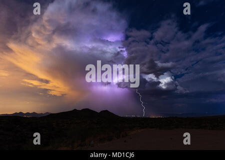 Arizona monsoon storm cumulonimbus clouds and lightning strike over Fountain Hills, Arizona