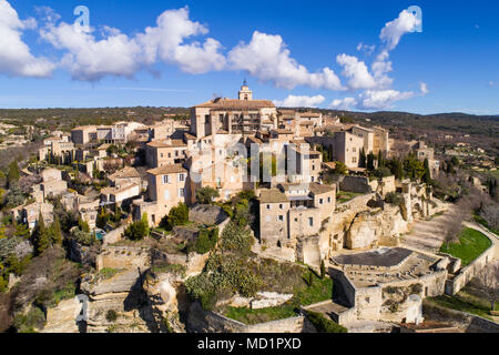 Aerial view of Gordes, labelled Most Beautiful Villages of France, perched on a rocky outcrop at the end of the Vaucluse plateau, dominated by its Ren Stock Photo