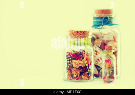 Sand and shells in bottle on white background. Free space for your text. Stock Photo