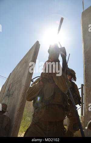 NATIONAL TRAINING CENTER, ISRAEL (March 12, 2018) U.S. Marines assigned to Battalion Landing Team, 2nd Battalion, 6th Marine Regiment (BLT 2/6), 26th Marine Expeditionary Unit conduct lane training alongside Israeli soldiers as part of exercise Juniper Cobra, Mar. 12, 2018. The 26th MEU is participating in Juniper Cobra with the Israeli Defense Force in order to improve interoperability and hone both forces’ skills in a variety of environments. Stock Photo