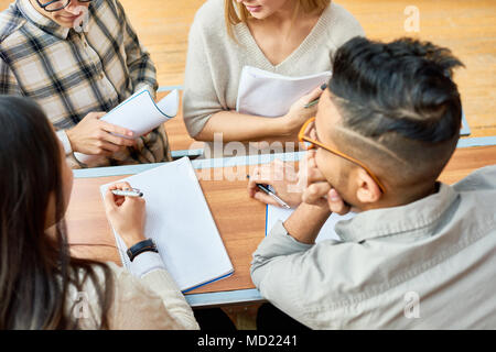 Students Working Together in University Stock Photo