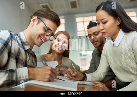 International Group of Students Collaborating Stock Photo