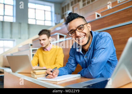 Happy Middle-Eastern Man in College Stock Photo