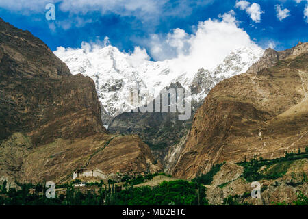 Baltit fort in mountains background, Karimabad, Hunza Valley, Gilgit-Baltistan region, Pakistan Stock Photo