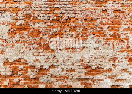 Old brick wall with white and red bricks background. Stock Photo