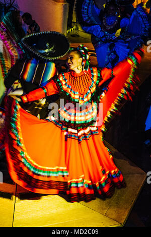 A couple of Mexican ranchera dancers performs at Focolare Restaurant, first opened in 1953 on the premises of an old traditional hacienda house in the Stock Photo