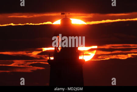 Sunrise at St Mary's Lighthouse in Whitley Bay, Northumberland. Stock Photo