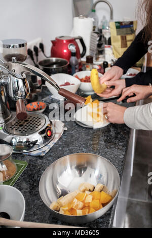 Young couple preparing food together Stock Photo