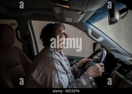 Riyadh, Saudi Arabia. 08th Feb, 2018. A picture made available on 18 April 2018 shows Saudi Arabian activist Madiha al-Ajroush who fights for the right of women to drive cars sitting in a vehicle which is parked in her driveway in Riyadh, Saudi Arabia, 08 February 2018. (to go with dpa-story about Saudi-Arabia in English text service) Credit: Oliver Weiken/dpa/Alamy Live News Stock Photo