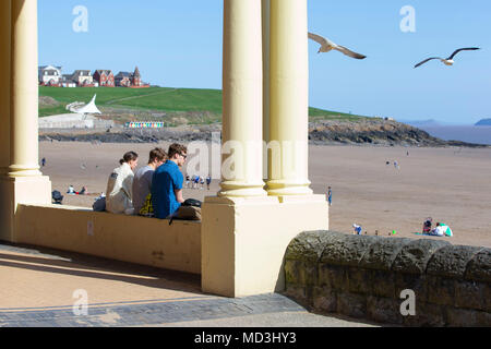 Barry Island, Wales, UK, April 18th 2018. Young people enjoy a Springtime heatwave at Barry Island beach. Credit: Mark Hawkins/Alamy Live News Stock Photo