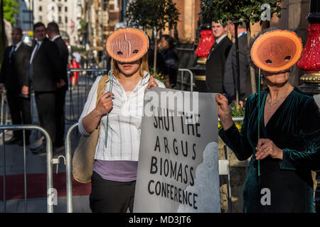 London, UK. 18th April, 2018. Counter Demo to the World's Largest Biomass Conference, in the Landmark hotel, Marylebone, London. They hope to bring greater scrutiny to a practice that's turning forests into pellets to supply the UK energy market. The protest was organised by Biofuelwatch who believe the practice is destroying the environment and reducing biodiversity. Credit: Guy Bell/Alamy Live News Stock Photo