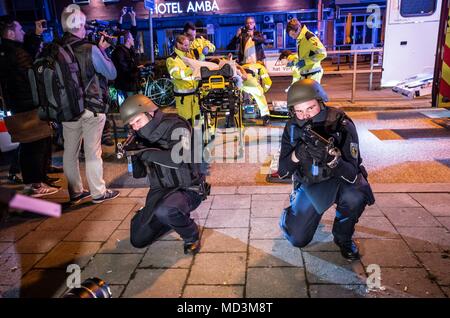 Munich, Bavaria, Germany. 18th Apr, 2018. During the night of April 17-18, the Munich Hauptbahnhof (train station) was closed for a large counter-terrorism training exercise, complete with the discharge of firearms, pursuits of suspects, and explosions. The main exercise began at midnight and proceeded until 4am and was designed to simulate a terrorist commando unit attacking the Munich Central Station (Hauptbahnhof), which the anti-terrorism units were instructed to neutralize. Credit: Sachelle Babbar/ZUMA Wire/Alamy Live News Stock Photo