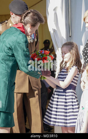 Greenwood Road, Pirbright. 18th April 2018. The 25th anniversary of the British Army’s largest Corps, the Royal Logistic Corps held its anniversary parade this afternoon. Her Royal Highness the Princess Royal was the guest of honour for this historic occasion. 6 year old Evie Jones presented the Princess with a beautiful bouquet of flowers. Evie is the daughter of Sergeant Stewart Jones of the 17 Port and Maritime Regiment. Credit: james jagger/Alamy Live News Stock Photo
