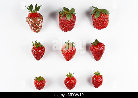 Ripe strawberries in chocolate on a white background Stock Photo