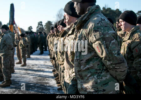 Soldiers from 2nd Battalion, 70th Armor Regiment, 2nd Armored Brigade Combat Team, 1st Infantry Division stand in formation while participating in a welcoming ceremony hosted by the Polish army in Świętoszów, Poland on March 19, 2018. (U.S. Army photo by Spc. Dustin D. Biven / 22nd Mobile Public Affairs Detachment) Stock Photo