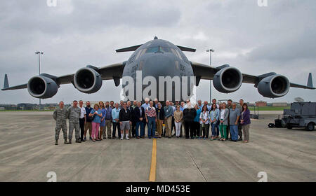 Attendees of the 315th Airlift Wing's 2018 Civic Leader Tour pose for a group photo in front of a Charleston C-17 Globemaster III at Joint Base San Antonio-Randolf. More than 30 community and business leaders from the Charleston area flew on the C-17  to participate in a Civic Leader tour to Texas March 15-16. (U.S. Air Force Photo by Tech. Sgt. Bobby Pilch) Stock Photo