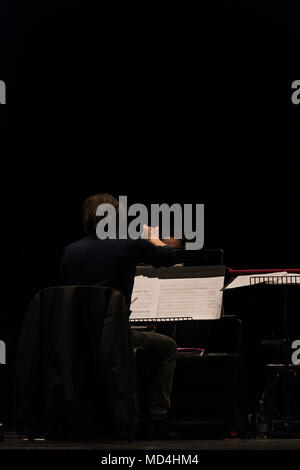 orchestra conductor on stage during reharsals Stock Photo