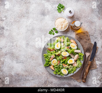 Caesar salad with eggs, chicken and parmesan Stock Photo