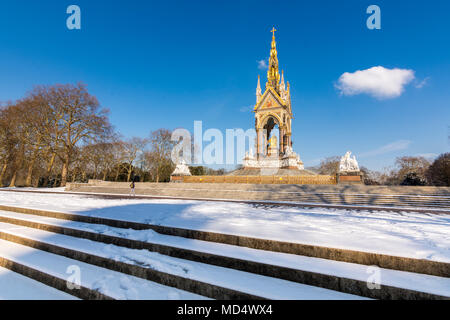London, UK - February 2, 2018: The Royal Albert Memorial in Hyde Park covered in snow Stock Photo