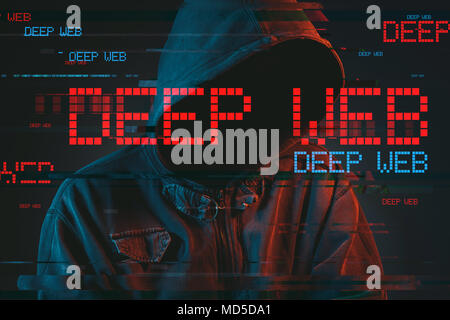 Deep web hacking concept with faceless hooded male person, low key red and blue lit image and digital glitch effect Stock Photo