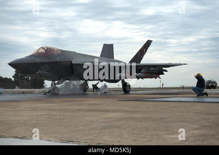 180319-N-ZZ999-0014 NAS PATUXTENT RIVER, Md. (March 19, 2018) Lt. Cmdr. Christopher Tabert, an F-35 Pax River Integrated Test Force test pilot, takes CF-5, a Navy F-35 variant, on one of the last system development and design tests with a 2,000-pound external weapons catapult March 19, 2018 at Naval Air Station Patuxent River, Md. The F-35C is a carrier variant designed for the U.S. Navy as a first-day-of-war, survivable strike fighter complement to the F/A-18 Super Hornet. (U. S. Navy photo by Arnel Parker/Released) Stock Photo