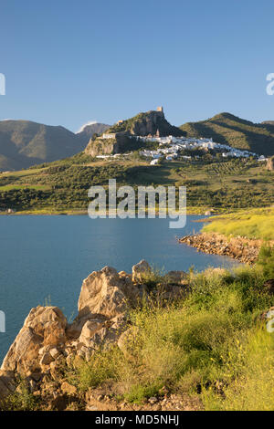 Moorish castle above white village and reservoir in spring, Zahara de la Sierra, Sierra de Grazalema Natural Park, Andalucia, Spain, Europe Stock Photo