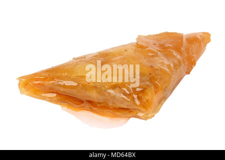 Sweet dessert triangular baklava isolated on white background. Stock Photo