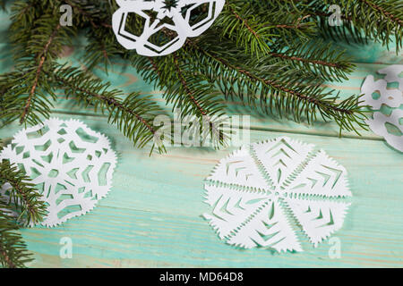 Paper snowflake and tied with twine. Stock Photo