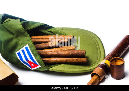 Cuban cigars on a pile isolated on white Stock Photo