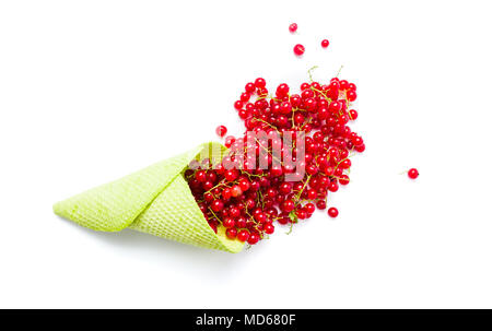 Red currant fruit in an ice cream cone on white Stock Photo