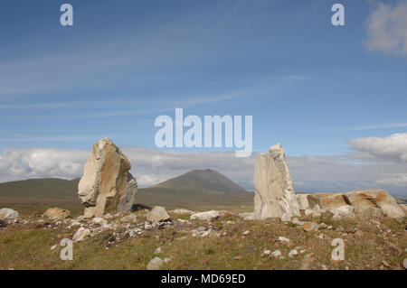 Twin Standing Stones with view of Mountain in between on the Westcoast of Ireland Stock Photo