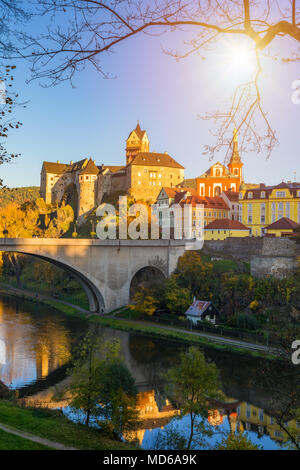 Colorful town Loket in autumn over Eger river in the Sokolov District in the Karlovy Vary region of the Czech Republic Stock Photo
